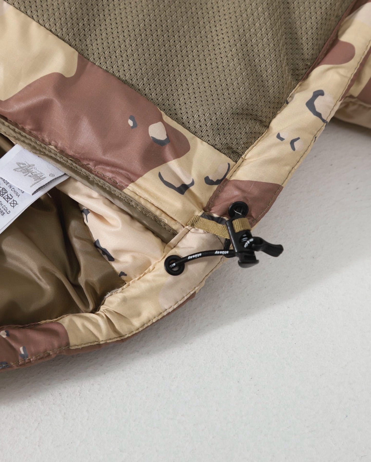 스투시 카모 립스탑 다운 파카 카키